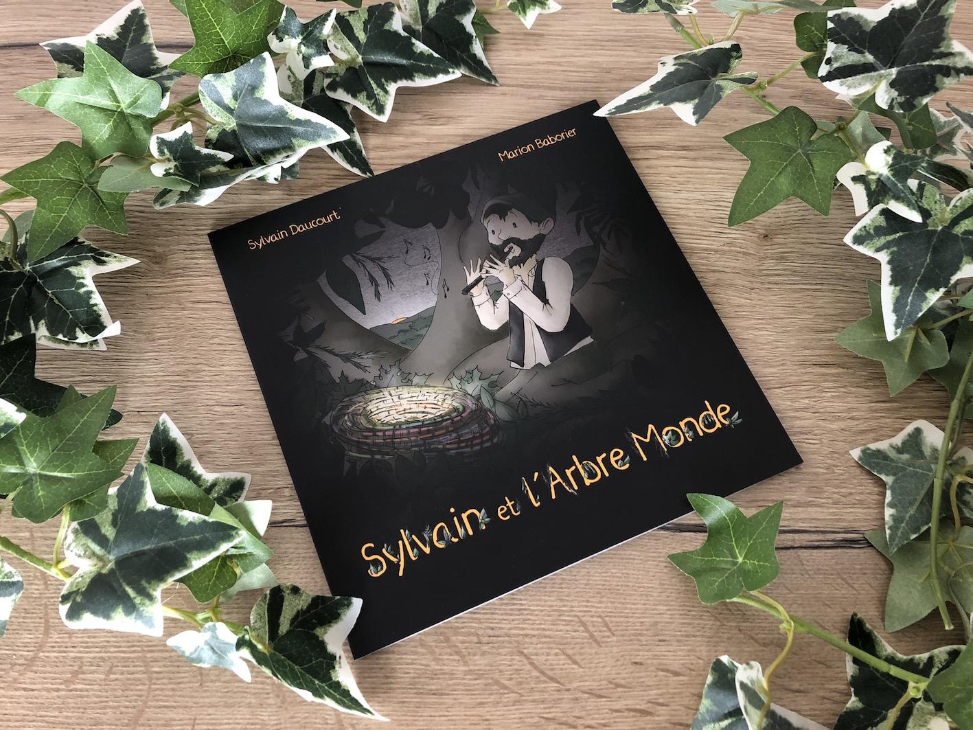 Livre sur table sylvain et larbre monde